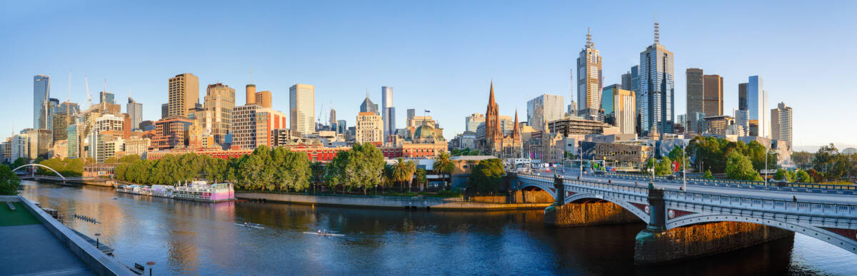 Panorama view of beautiful Melbourne cityscape skyline at sunrise in Australia .